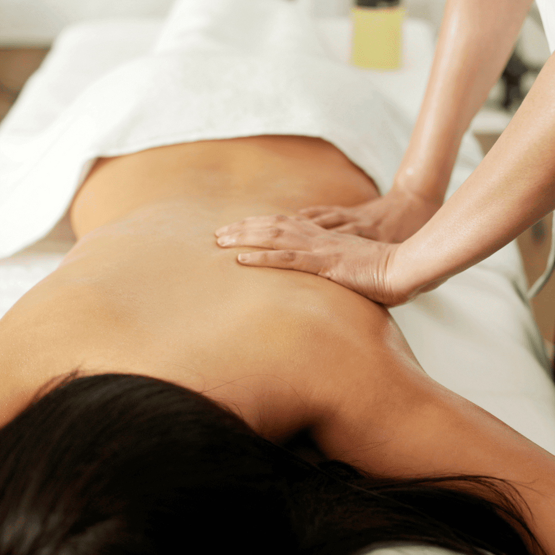 Woman being massaged in a luxury spa